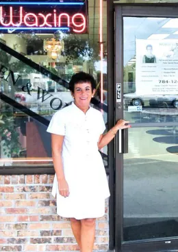 Alicja at the door of La' Riviera Salon